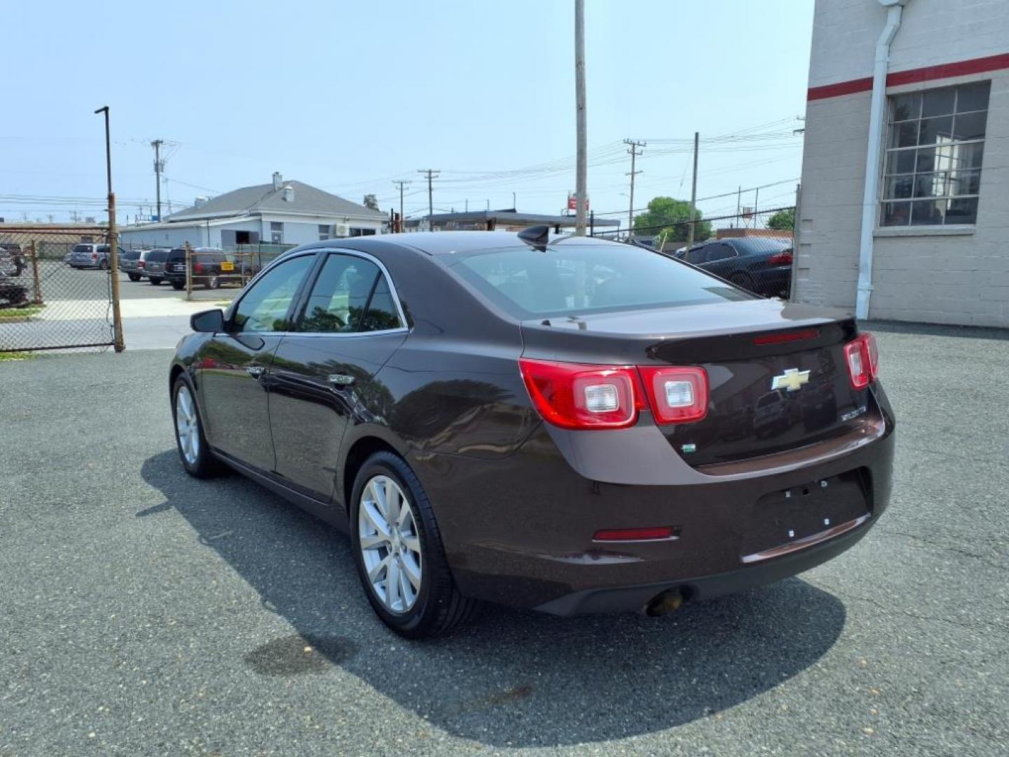 2015 Brown Chevrolet Malibu LTZ (1G11F5SL9FF) with an 2.5L Ecotec 2.5L I4 196hp 191ft. lbs. Fuel Injected engine, 6-Speed Shiftable Automatic w/Overdrive transmission, located at 50 Eastern Blvd., Essex, MD, 21221, (410) 686-3444, 39.304367, -76.484947 - Photo#2