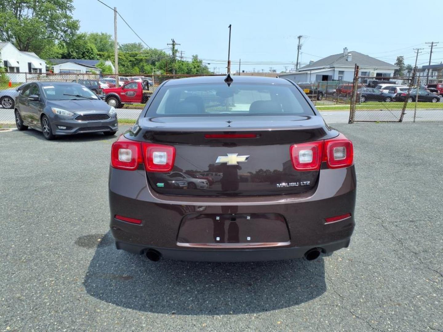 2015 Brown Chevrolet Malibu LTZ (1G11F5SL9FF) with an 2.5L Ecotec 2.5L I4 196hp 191ft. lbs. Fuel Injected engine, 6-Speed Shiftable Automatic w/Overdrive transmission, located at 50 Eastern Blvd., Essex, MD, 21221, (410) 686-3444, 39.304367, -76.484947 - Photo#3