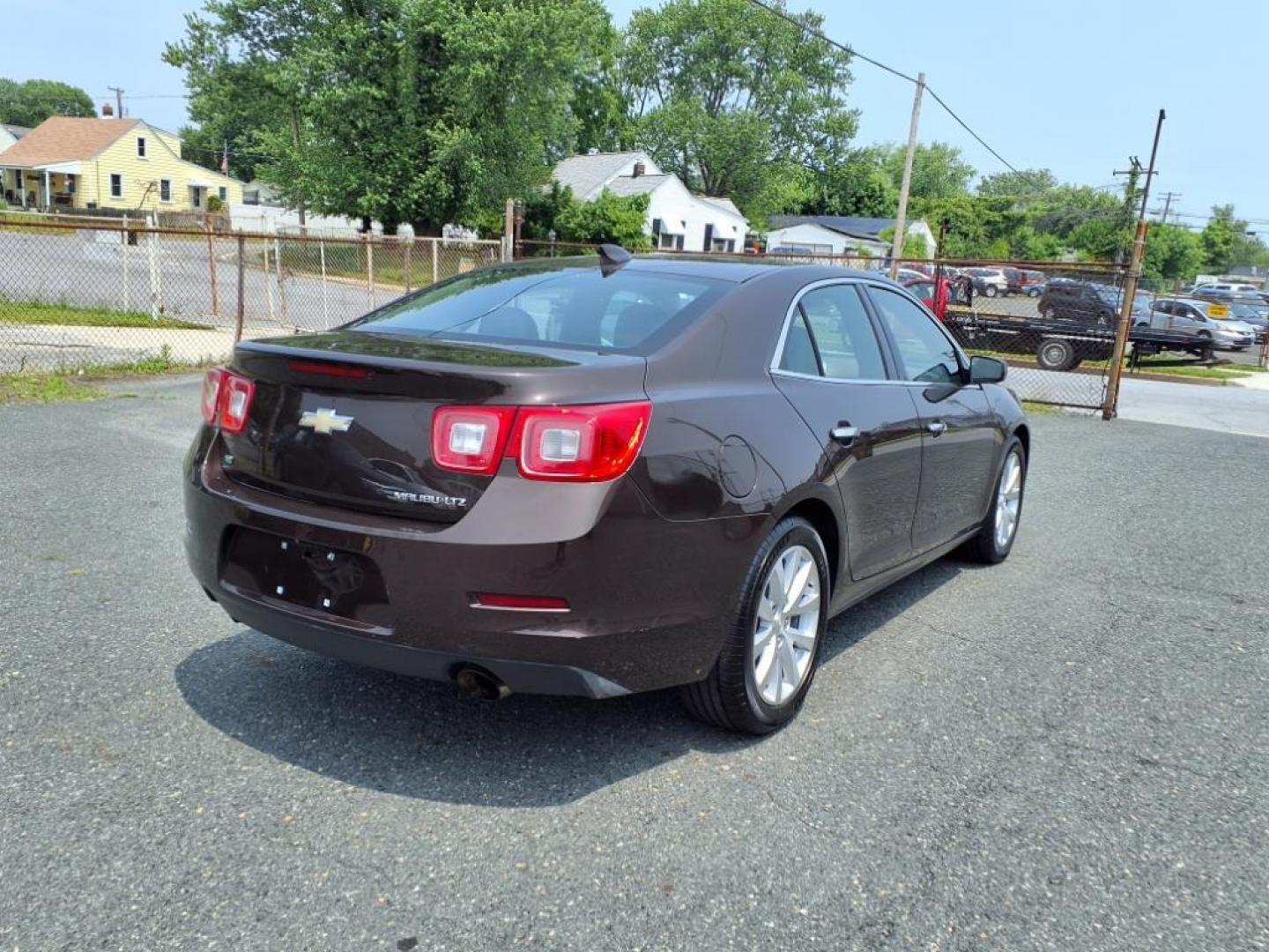 2015 Brown Chevrolet Malibu LTZ (1G11F5SL9FF) with an 2.5L Ecotec 2.5L I4 196hp 191ft. lbs. Fuel Injected engine, 6-Speed Shiftable Automatic w/Overdrive transmission, located at 50 Eastern Blvd., Essex, MD, 21221, (410) 686-3444, 39.304367, -76.484947 - Photo#4