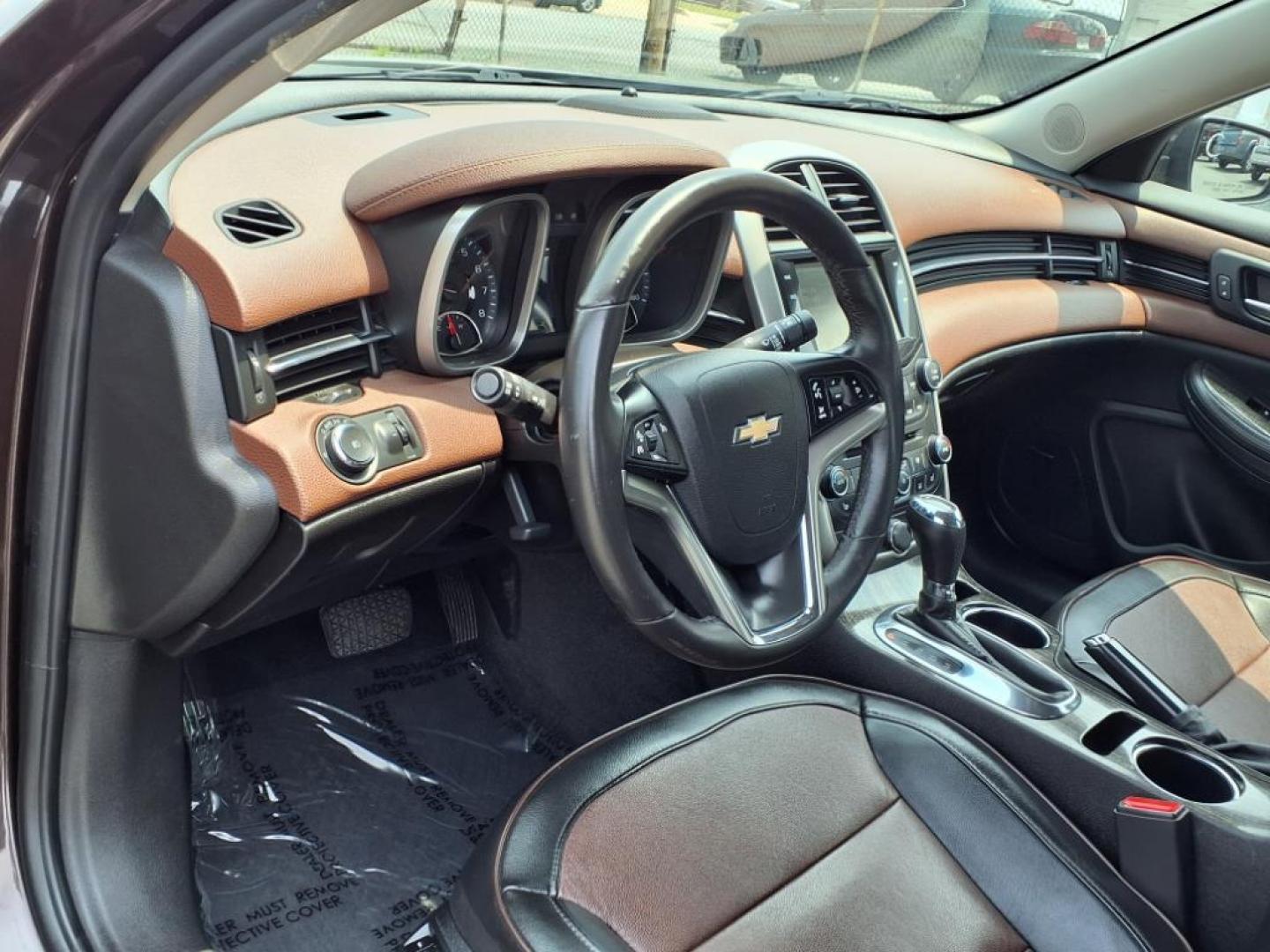 2015 Brown Chevrolet Malibu LTZ (1G11F5SL9FF) with an 2.5L Ecotec 2.5L I4 196hp 191ft. lbs. Fuel Injected engine, 6-Speed Shiftable Automatic w/Overdrive transmission, located at 50 Eastern Blvd., Essex, MD, 21221, (410) 686-3444, 39.304367, -76.484947 - Photo#9