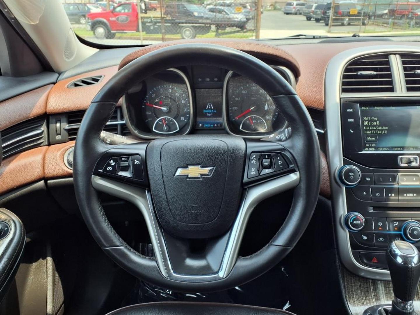 2015 Brown Chevrolet Malibu LTZ (1G11F5SL9FF) with an 2.5L Ecotec 2.5L I4 196hp 191ft. lbs. Fuel Injected engine, 6-Speed Shiftable Automatic w/Overdrive transmission, located at 50 Eastern Blvd., Essex, MD, 21221, (410) 686-3444, 39.304367, -76.484947 - Photo#12