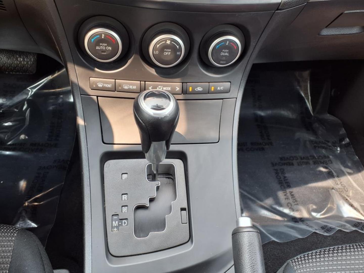 2013 Velocity Red Mazda Mazda3 i Touring (JM1BL1VPXD1) with an 2.0L SKYACTIV-G 2.0L I4 155hp 148ft. lbs. Sequential-Port F.I. engine, 6-Speed Shiftable Automatic transmission, located at 50 Eastern Blvd., Essex, MD, 21221, (410) 686-3444, 39.304367, -76.484947 - Photo#17