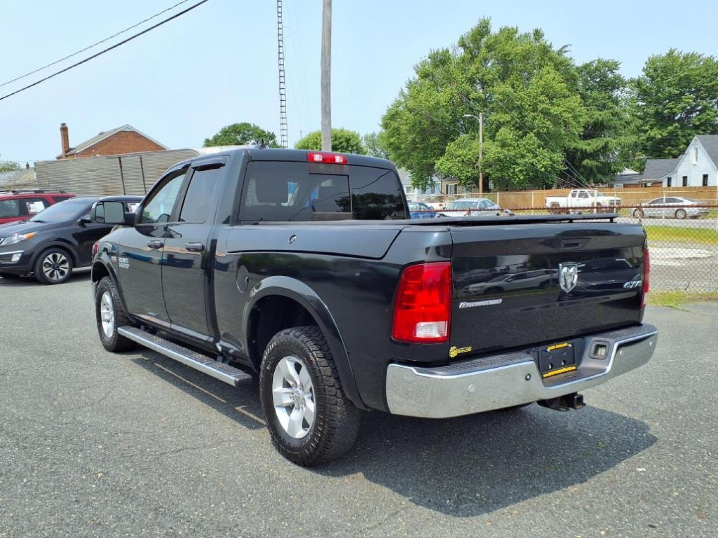2016 Black Forest Green Pearl Coat RAM 1500 Outdoorsman (1C6RR7GT3GS) with an 5.7L HEMI 5.7L V8 395hp 410ft. lbs. Sequential-Port F.I. engine, 8-Speed Shiftable Automatic transmission, located at 50 Eastern Blvd., Essex, MD, 21221, (410) 686-3444, 39.304367, -76.484947 - Photo#2