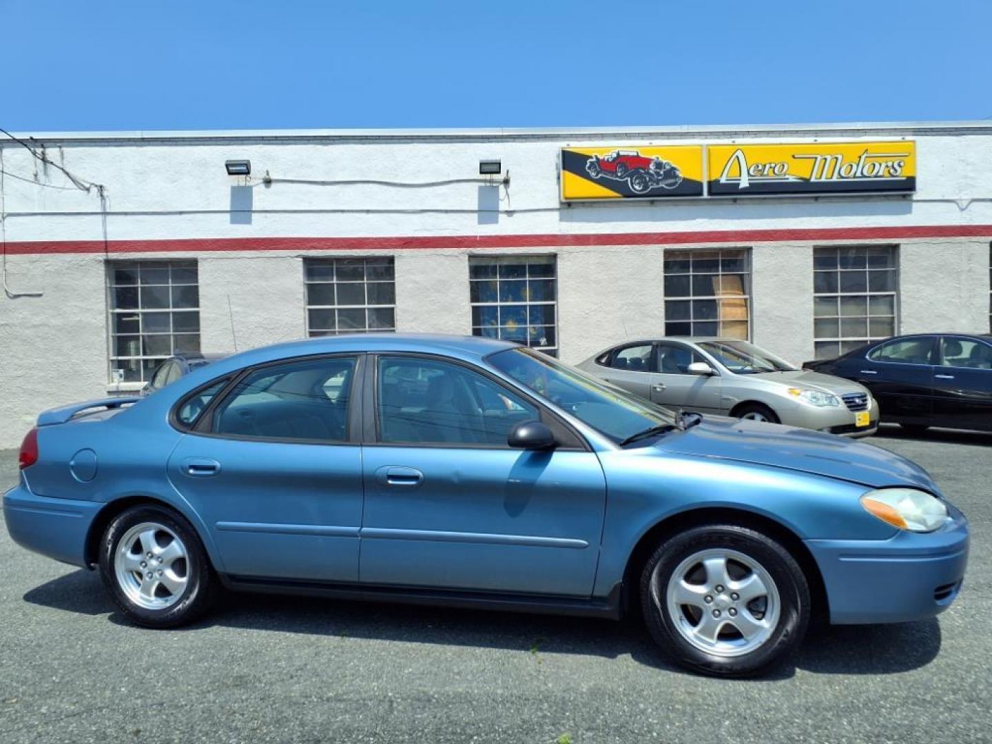 2005 Blue Ford Taurus SE (1FAHP53285A) with an 3.0L 6 Cylinder Fuel Injected engine, Automatic transmission, located at 50 Eastern Blvd., Essex, MD, 21221, (410) 686-3444, 39.304367, -76.484947 - Photo#5
