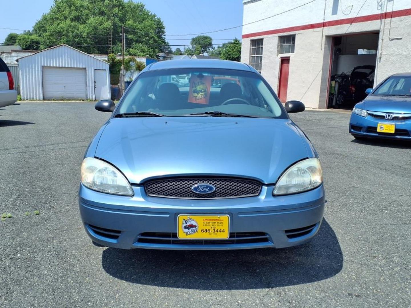 2005 Blue Ford Taurus SE (1FAHP53285A) with an 3.0L 6 Cylinder Fuel Injected engine, Automatic transmission, located at 50 Eastern Blvd., Essex, MD, 21221, (410) 686-3444, 39.304367, -76.484947 - Photo#7