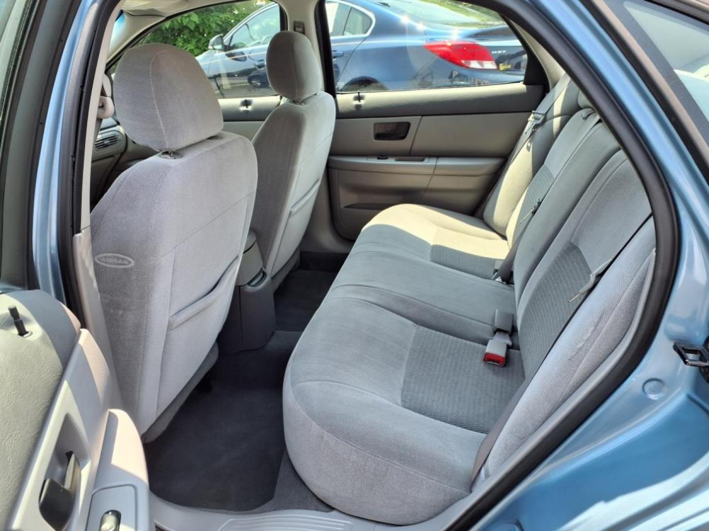 2005 Blue Ford Taurus SE (1FAHP53285A) with an 3.0L 6 Cylinder Fuel Injected engine, Automatic transmission, located at 50 Eastern Blvd., Essex, MD, 21221, (410) 686-3444, 39.304367, -76.484947 - Photo#12
