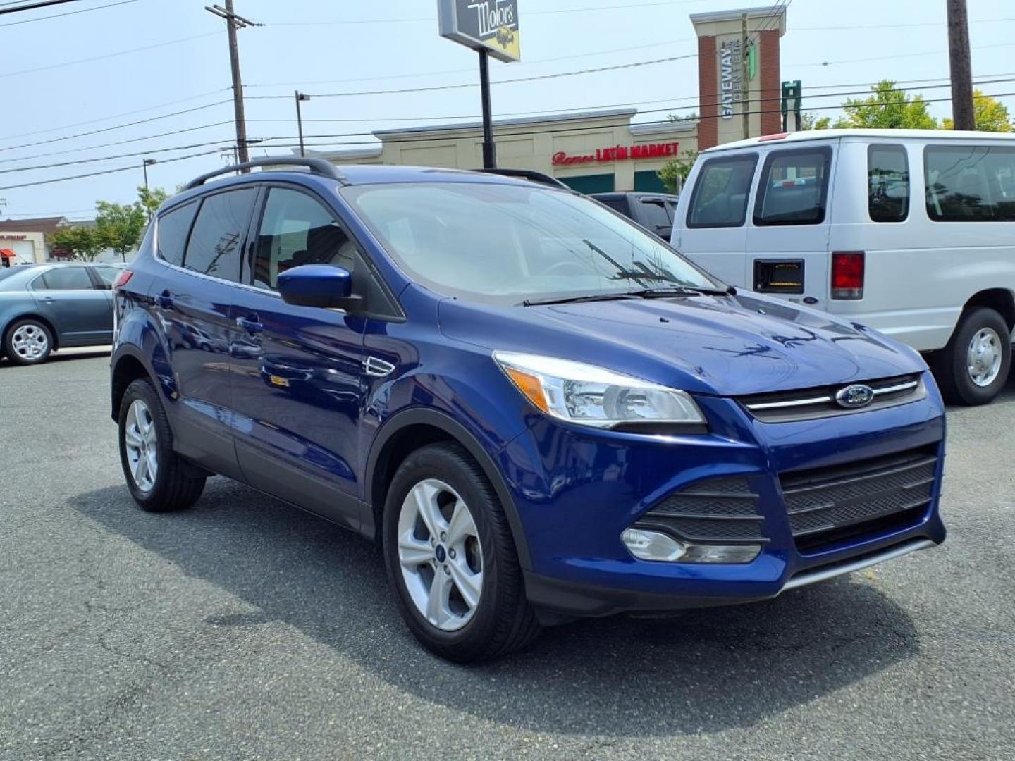 2016 Deep Impact Blue Ford Escape SE (1FMCU0GX7GU) with an 1.6L EcoBoost 1.6L Turbo I4 178hp 184ft. lbs. Turbocharged engine, 6-Speed Shiftable Automatic transmission, located at 50 Eastern Blvd., Essex, MD, 21221, (410) 686-3444, 39.304367, -76.484947 - Photo#7