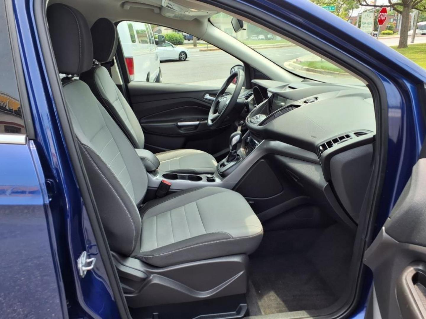 2016 Deep Impact Blue Ford Escape SE (1FMCU0GX7GU) with an 1.6L EcoBoost 1.6L Turbo I4 178hp 184ft. lbs. Turbocharged engine, 6-Speed Shiftable Automatic transmission, located at 50 Eastern Blvd., Essex, MD, 21221, (410) 686-3444, 39.304367, -76.484947 - Photo#16