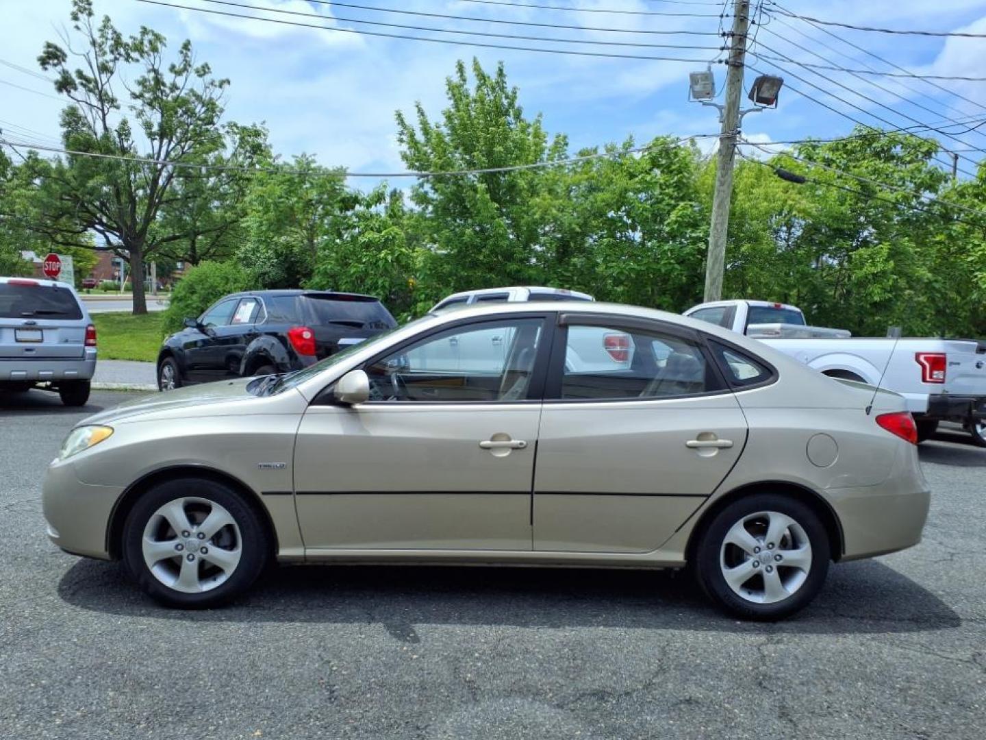 2007 Laguna Sand Hyundai ELANTRA Limited (KMHDU46D07U) with an 2.0L 2.0L I4 138hp 136ft. lbs. Sequential-Port F.I. engine, Automatic transmission, located at 50 Eastern Blvd., Essex, MD, 21221, (410) 686-3444, 39.304367, -76.484947 - Photo#1