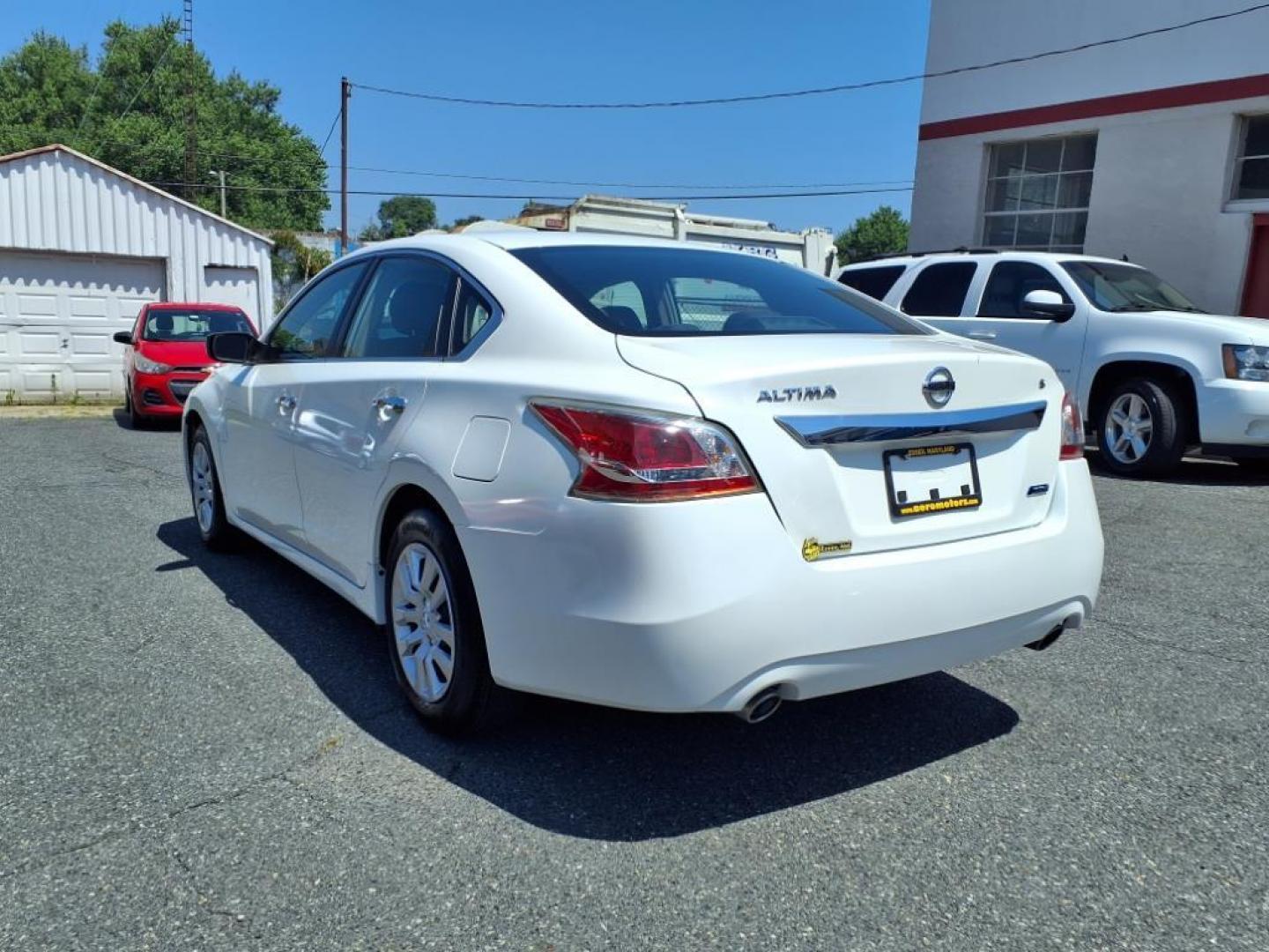 2013 Pearl White Nissan Altima 2.5 S (1N4AL3AP7DC) with an 2.5L 2.5L I4 182hp 180ft. lbs. Sequential-Port F.I. engine, CVT transmission, located at 50 Eastern Blvd., Essex, MD, 21221, (410) 686-3444, 39.304367, -76.484947 - Photo#2