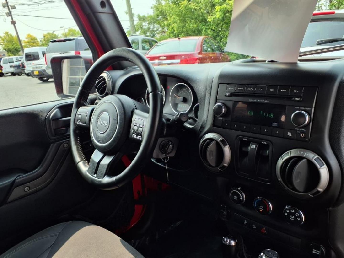 2017 Firecracker Red Clear Coat Jeep Wrangler Sport (1C4GJWAG3HL) with an 3.6L 3.6L V6 285hp 260ft. lbs. Sequential-Port F.I. engine, Automatic transmission, located at 50 Eastern Blvd., Essex, MD, 21221, (410) 686-3444, 39.304367, -76.484947 - Photo#15