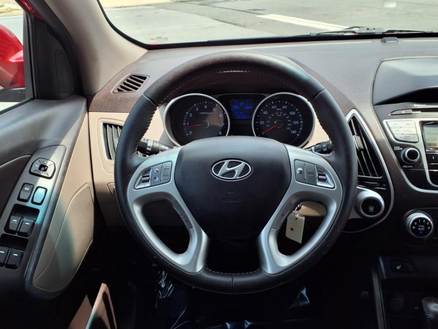 2013 Garnet Red Mica Hyundai TUCSON Limited (KM8JU3AC6DU) with an 2.4L 2.4L I4 176hp 168ft. lbs. Sequential-Port F.I. engine, 6-Speed Shiftable Automatic transmission, located at 50 Eastern Blvd., Essex, MD, 21221, (410) 686-3444, 39.304367, -76.484947 - Photo#13