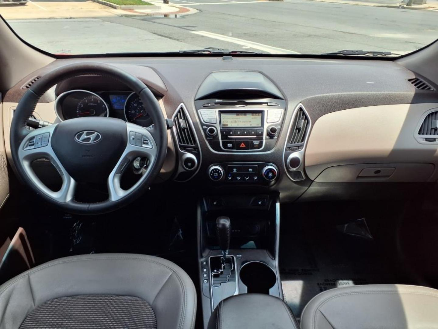 2013 Garnet Red Mica Hyundai TUCSON Limited (KM8JU3AC6DU) with an 2.4L 2.4L I4 176hp 168ft. lbs. Sequential-Port F.I. engine, 6-Speed Shiftable Automatic transmission, located at 50 Eastern Blvd., Essex, MD, 21221, (410) 686-3444, 39.304367, -76.484947 - Photo#14