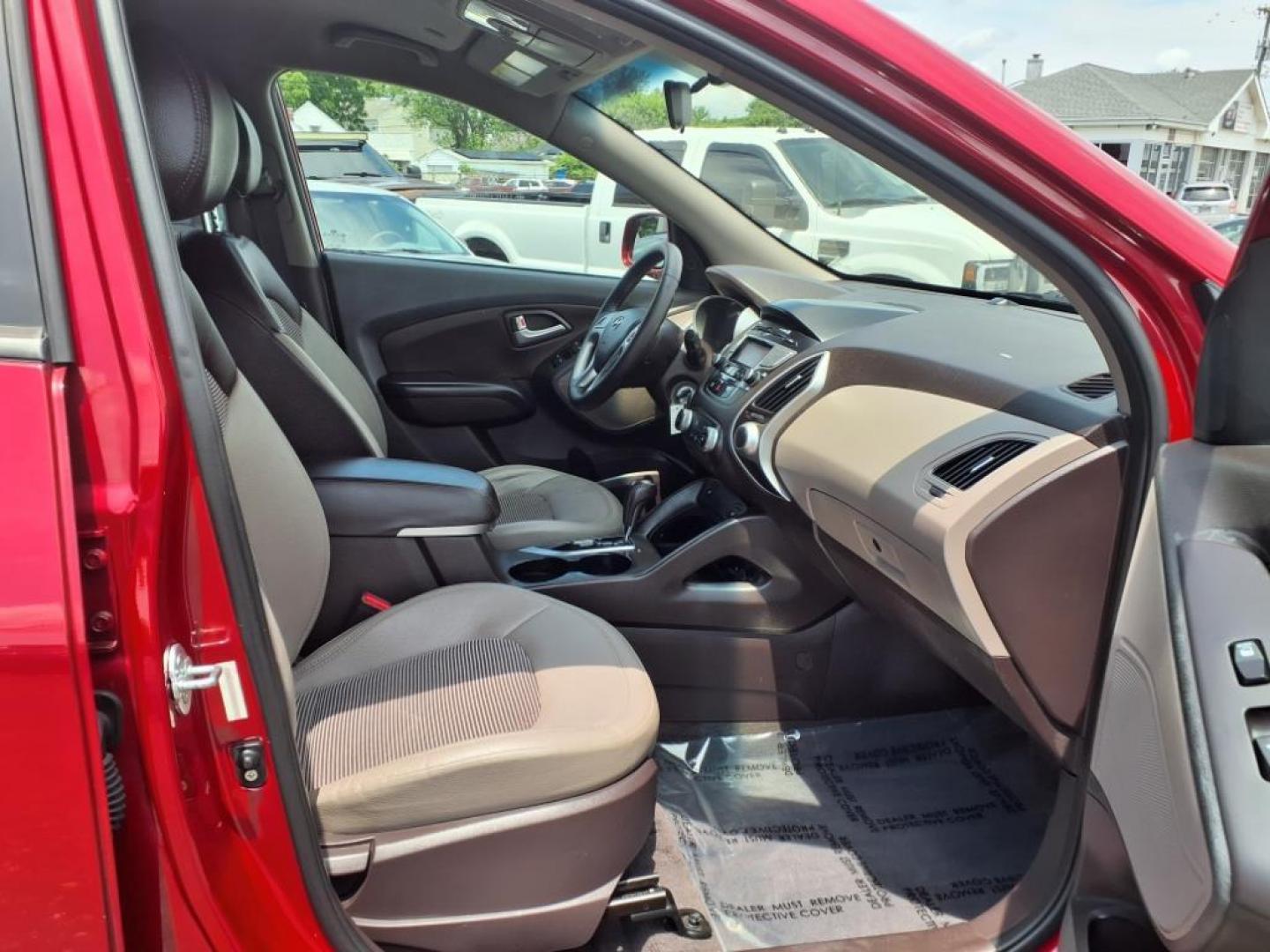 2013 Garnet Red Mica Hyundai TUCSON Limited (KM8JU3AC6DU) with an 2.4L 2.4L I4 176hp 168ft. lbs. Sequential-Port F.I. engine, 6-Speed Shiftable Automatic transmission, located at 50 Eastern Blvd., Essex, MD, 21221, (410) 686-3444, 39.304367, -76.484947 - Photo#15