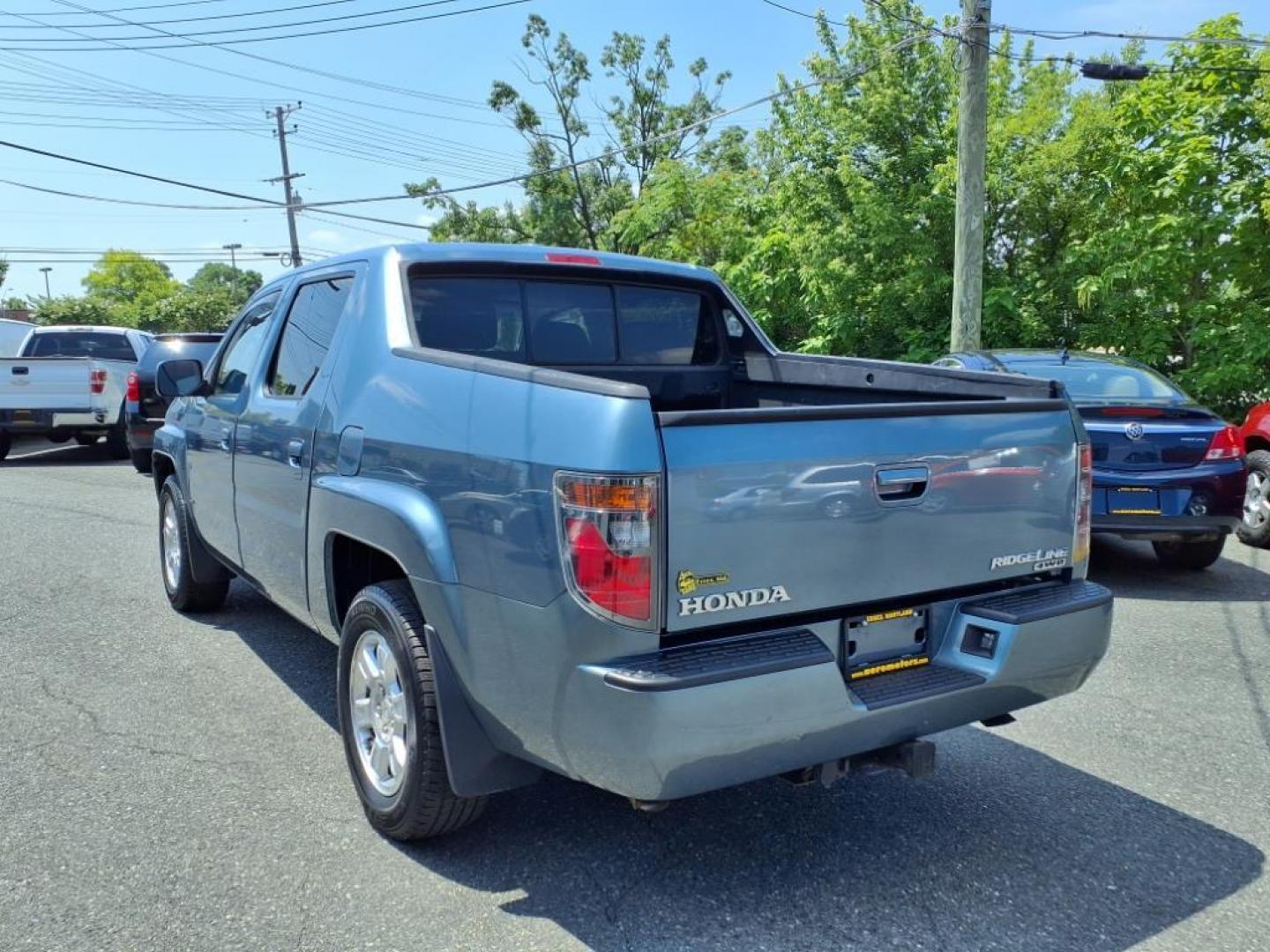 2008 Steel Blue Metallic Honda Ridgeline RTL (2HJYK16568H) with an 3.5L 3.5L V6 247hp 245ft. lbs. Sequential-Port F.I. engine, 5-Speed Automatic transmission, located at 50 Eastern Blvd., Essex, MD, 21221, (410) 686-3444, 39.304367, -76.484947 - Photo#2