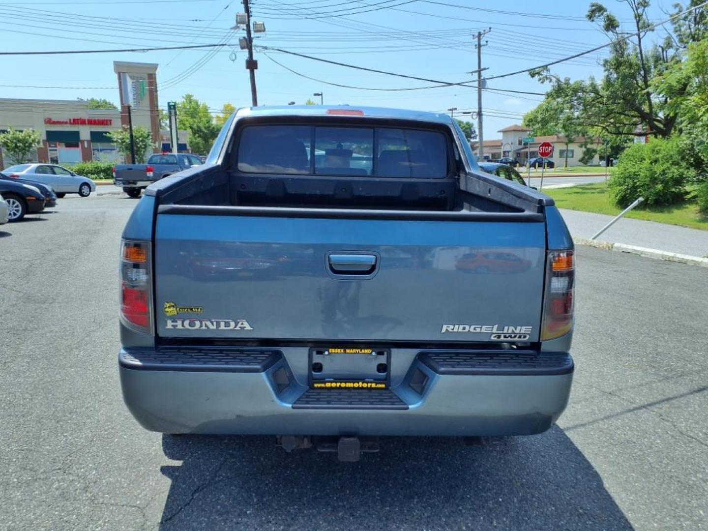 2008 Steel Blue Metallic Honda Ridgeline RTL (2HJYK16568H) with an 3.5L 3.5L V6 247hp 245ft. lbs. Sequential-Port F.I. engine, 5-Speed Automatic transmission, located at 50 Eastern Blvd., Essex, MD, 21221, (410) 686-3444, 39.304367, -76.484947 - Photo#3