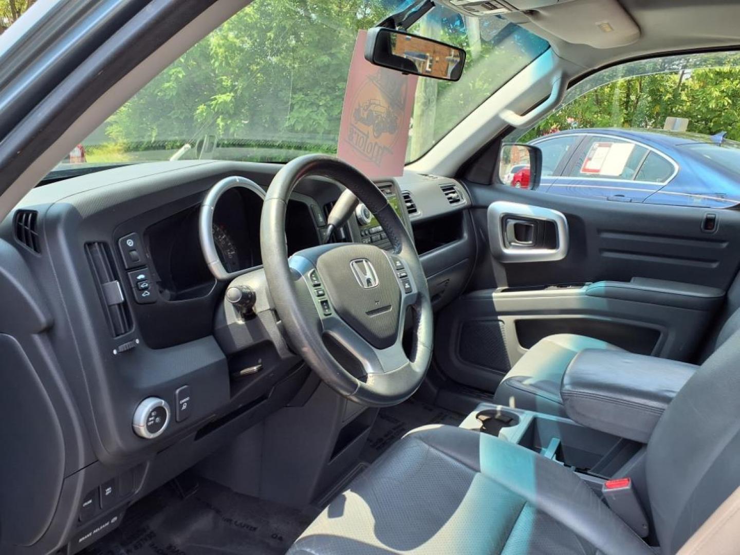 2008 Steel Blue Metallic Honda Ridgeline RTL (2HJYK16568H) with an 3.5L 3.5L V6 247hp 245ft. lbs. Sequential-Port F.I. engine, 5-Speed Automatic transmission, located at 50 Eastern Blvd., Essex, MD, 21221, (410) 686-3444, 39.304367, -76.484947 - Photo#8