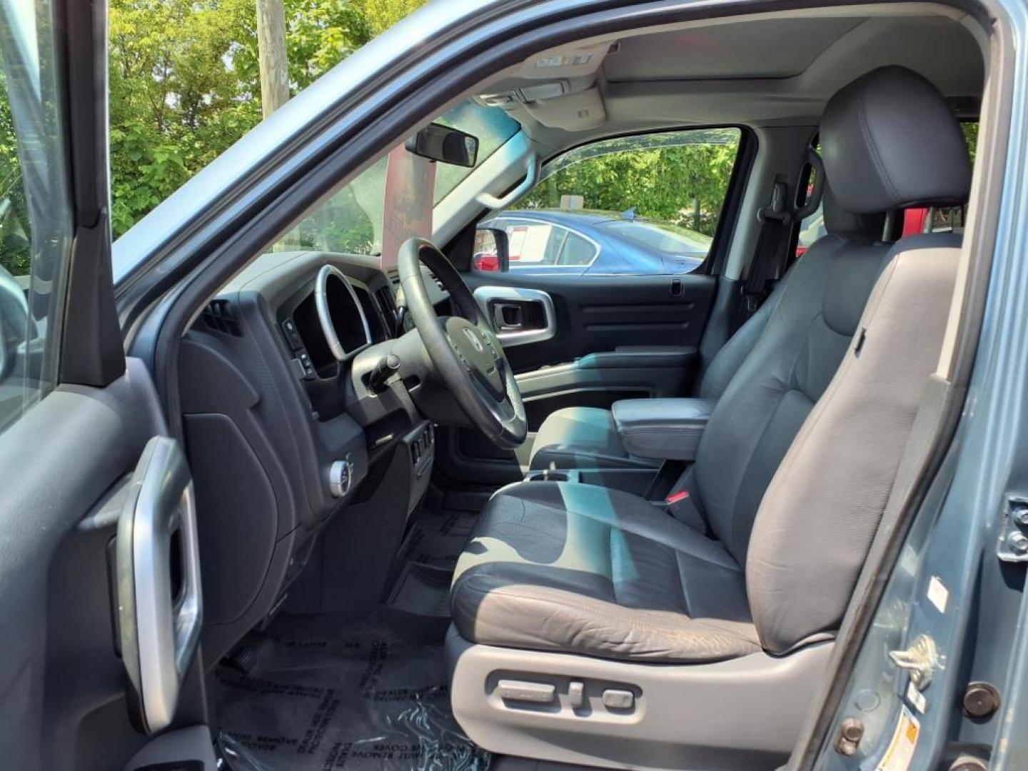 2008 Steel Blue Metallic Honda Ridgeline RTL (2HJYK16568H) with an 3.5L 3.5L V6 247hp 245ft. lbs. Sequential-Port F.I. engine, 5-Speed Automatic transmission, located at 50 Eastern Blvd., Essex, MD, 21221, (410) 686-3444, 39.304367, -76.484947 - Photo#9