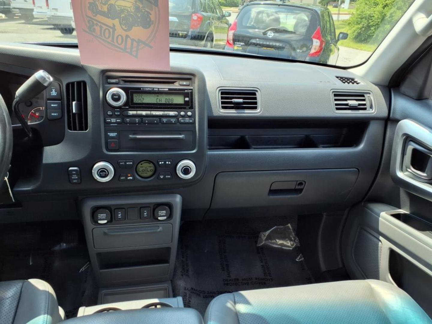 2008 Steel Blue Metallic Honda Ridgeline RTL (2HJYK16568H) with an 3.5L 3.5L V6 247hp 245ft. lbs. Sequential-Port F.I. engine, 5-Speed Automatic transmission, located at 50 Eastern Blvd., Essex, MD, 21221, (410) 686-3444, 39.304367, -76.484947 - Photo#14