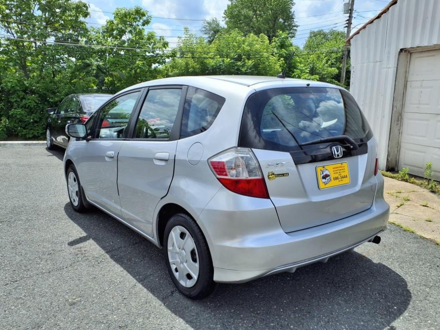 2012 Alabaster Silver Metallic Honda Fit Base (JHMGE8H37CC) with an 1.5L 1.5L I4 117hp 106ft. lbs. Sequential-Port F.I. engine, 5-Speed Automatic transmission, located at 50 Eastern Blvd., Essex, MD, 21221, (410) 686-3444, 39.304367, -76.484947 - Photo#2