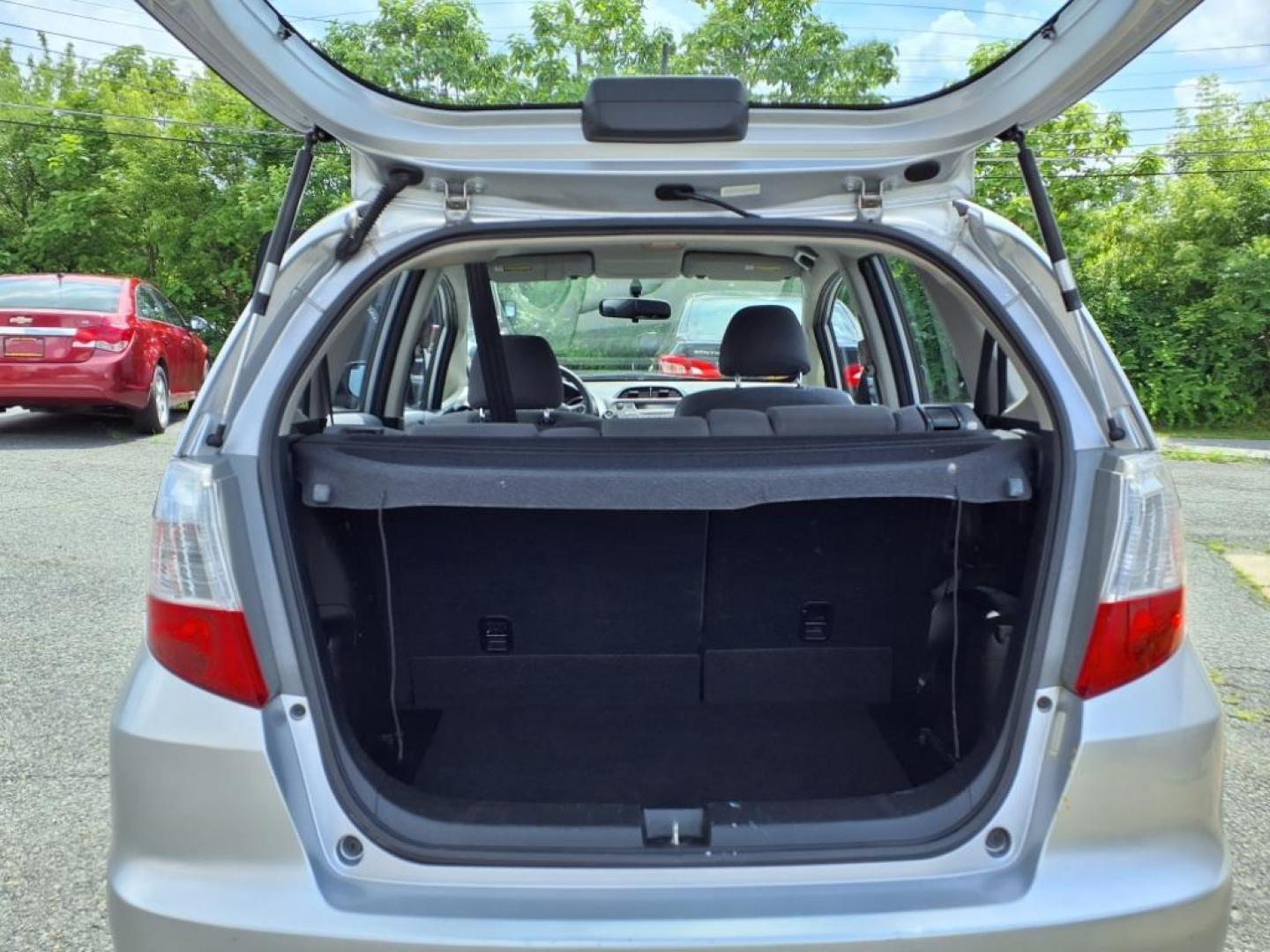 2012 Alabaster Silver Metallic Honda Fit Base (JHMGE8H37CC) with an 1.5L 1.5L I4 117hp 106ft. lbs. Sequential-Port F.I. engine, 5-Speed Automatic transmission, located at 50 Eastern Blvd., Essex, MD, 21221, (410) 686-3444, 39.304367, -76.484947 - Photo#4