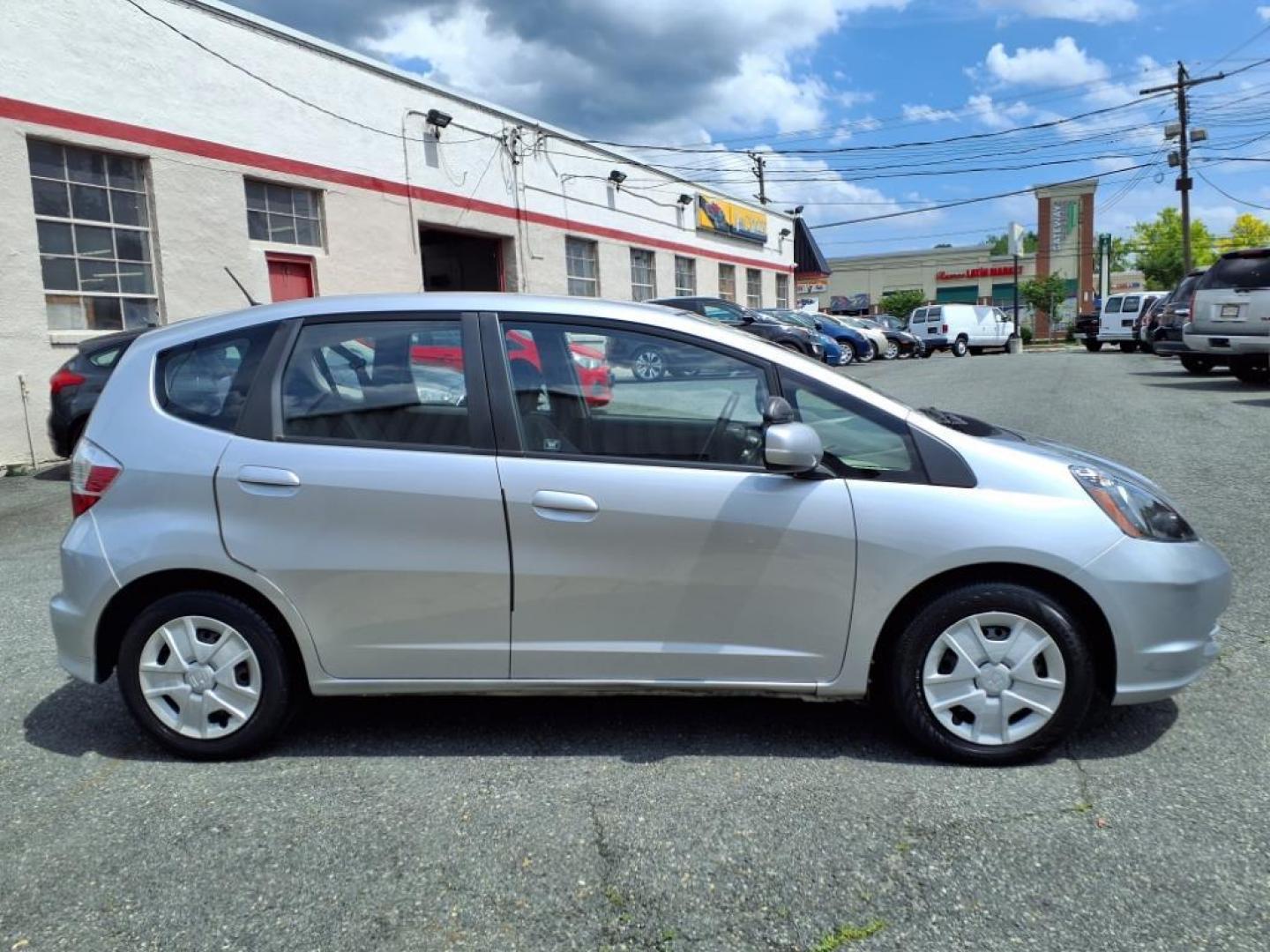 2012 Alabaster Silver Metallic Honda Fit Base (JHMGE8H37CC) with an 1.5L 1.5L I4 117hp 106ft. lbs. Sequential-Port F.I. engine, 5-Speed Automatic transmission, located at 50 Eastern Blvd., Essex, MD, 21221, (410) 686-3444, 39.304367, -76.484947 - Photo#6