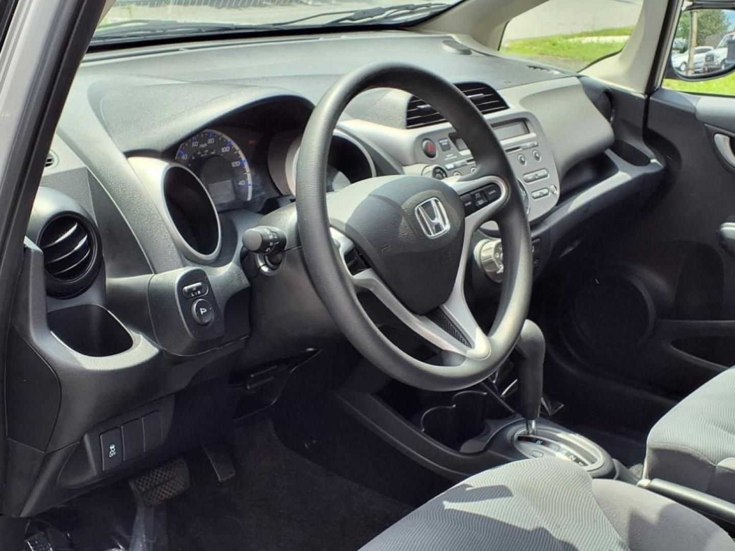 2012 Alabaster Silver Metallic Honda Fit Base (JHMGE8H37CC) with an 1.5L 1.5L I4 117hp 106ft. lbs. Sequential-Port F.I. engine, 5-Speed Automatic transmission, located at 50 Eastern Blvd., Essex, MD, 21221, (410) 686-3444, 39.304367, -76.484947 - Photo#11