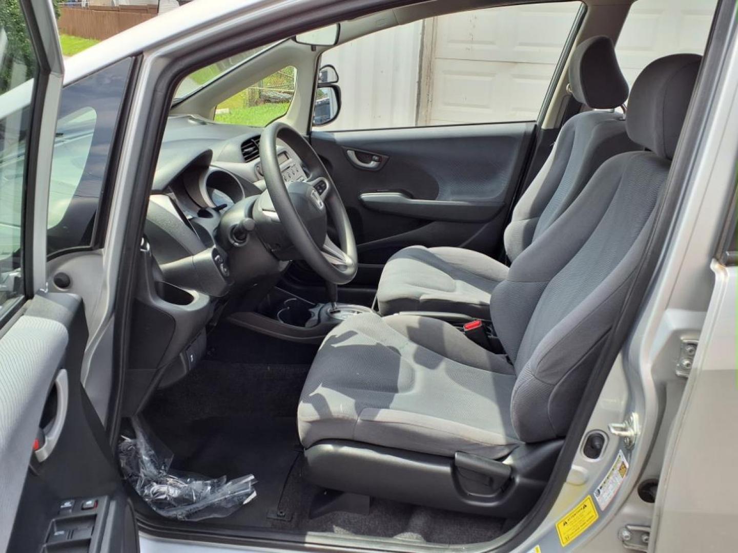 2012 Alabaster Silver Metallic Honda Fit Base (JHMGE8H37CC) with an 1.5L 1.5L I4 117hp 106ft. lbs. Sequential-Port F.I. engine, 5-Speed Automatic transmission, located at 50 Eastern Blvd., Essex, MD, 21221, (410) 686-3444, 39.304367, -76.484947 - Photo#12