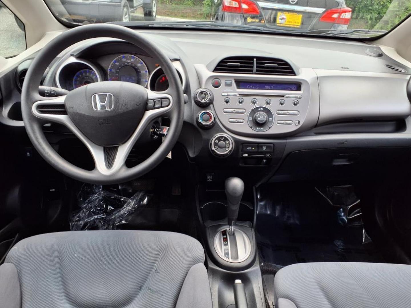 2012 Alabaster Silver Metallic Honda Fit Base (JHMGE8H37CC) with an 1.5L 1.5L I4 117hp 106ft. lbs. Sequential-Port F.I. engine, 5-Speed Automatic transmission, located at 50 Eastern Blvd., Essex, MD, 21221, (410) 686-3444, 39.304367, -76.484947 - Photo#15
