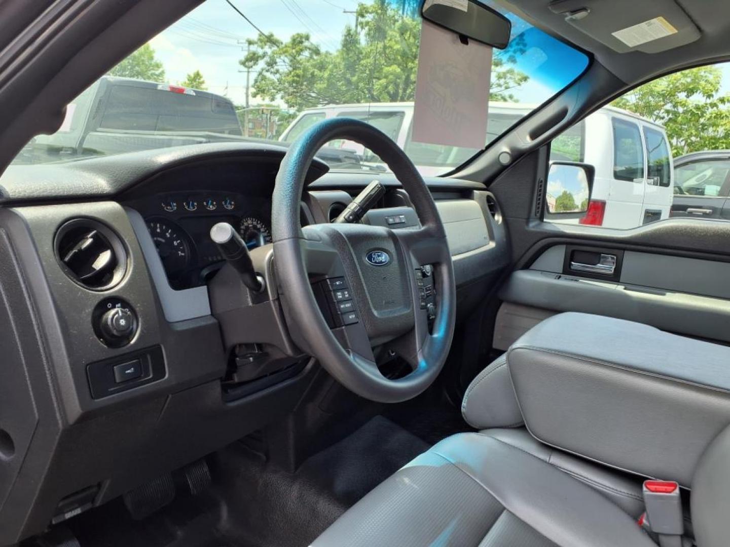 2014 Oxford White Ford F-150 XL (1FTMF1CM0EK) with an 3.7L 3.7L Flex Fuel V6 302hp 278ft. lbs. Sequential-Port F.I. engine, 6-Speed Automatic transmission, located at 50 Eastern Blvd., Essex, MD, 21221, (410) 686-3444, 39.304367, -76.484947 - Photo#11