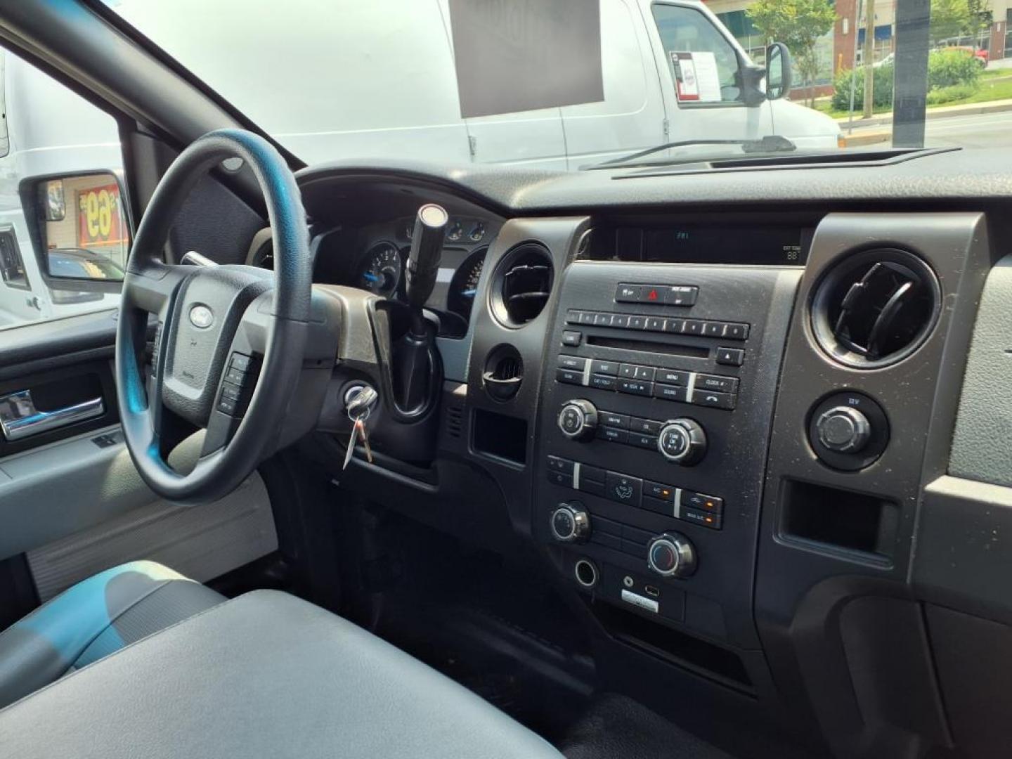2014 Oxford White Ford F-150 XL (1FTMF1CM0EK) with an 3.7L 3.7L Flex Fuel V6 302hp 278ft. lbs. Sequential-Port F.I. engine, 6-Speed Automatic transmission, located at 50 Eastern Blvd., Essex, MD, 21221, (410) 686-3444, 39.304367, -76.484947 - Photo#14