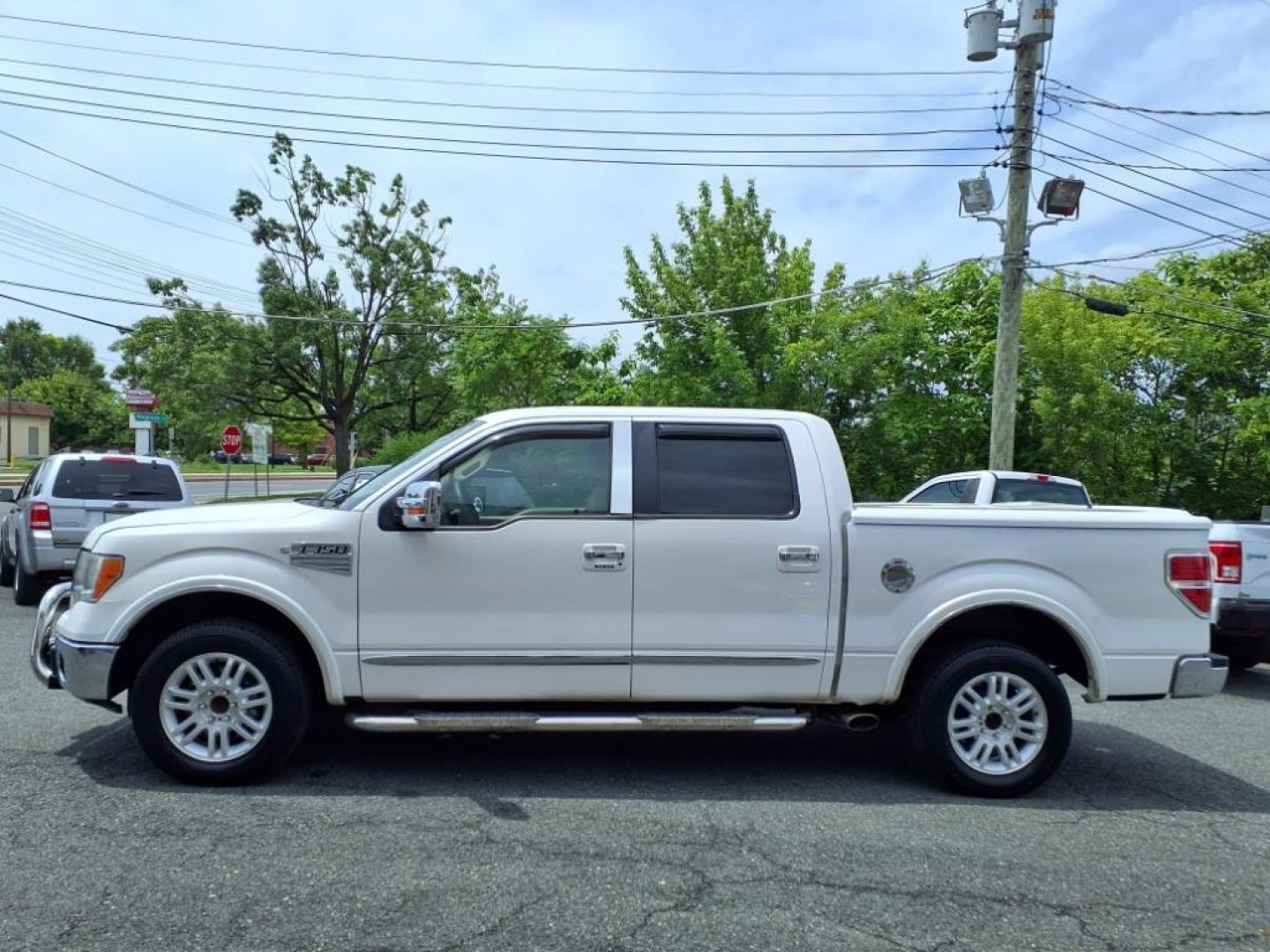 2010 Oxford White Ford F-150 Lariat (1FTFW1CV8AF) with an 5.4L Triton 5.4L Flex Fuel V8 320hp 390ft. lbs. Sequential-Port F.I. engine, 6-Speed Automatic transmission, located at 50 Eastern Blvd., Essex, MD, 21221, (410) 686-3444, 39.304367, -76.484947 - Photo#1