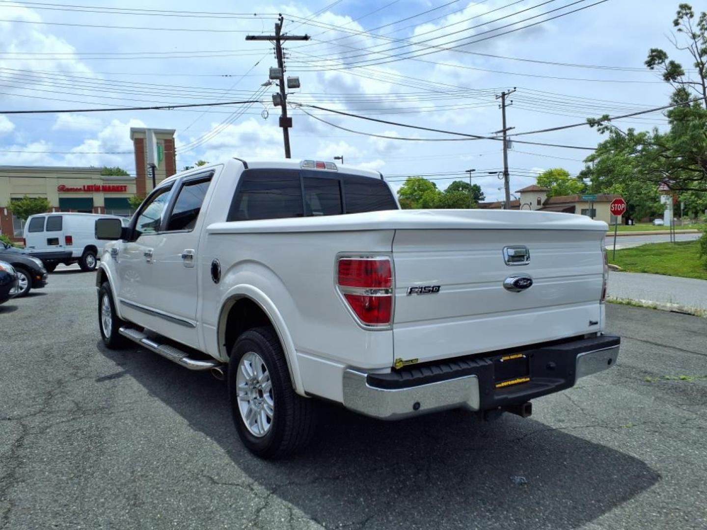 2010 Oxford White Ford F-150 Lariat (1FTFW1CV8AF) with an 5.4L Triton 5.4L Flex Fuel V8 320hp 390ft. lbs. Sequential-Port F.I. engine, 6-Speed Automatic transmission, located at 50 Eastern Blvd., Essex, MD, 21221, (410) 686-3444, 39.304367, -76.484947 - Photo#2