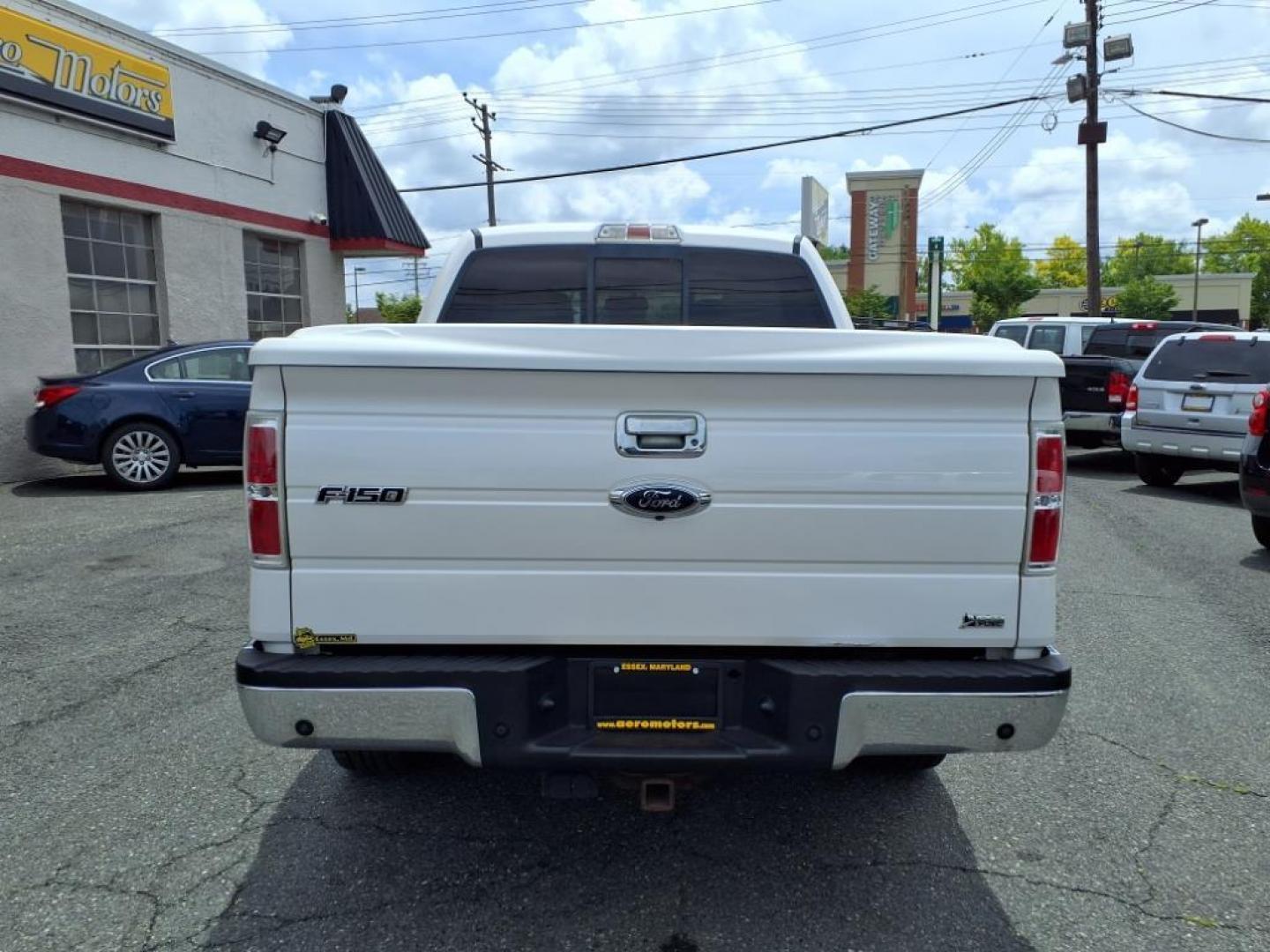 2010 Oxford White Ford F-150 Lariat (1FTFW1CV8AF) with an 5.4L Triton 5.4L Flex Fuel V8 320hp 390ft. lbs. Sequential-Port F.I. engine, 6-Speed Automatic transmission, located at 50 Eastern Blvd., Essex, MD, 21221, (410) 686-3444, 39.304367, -76.484947 - Photo#3