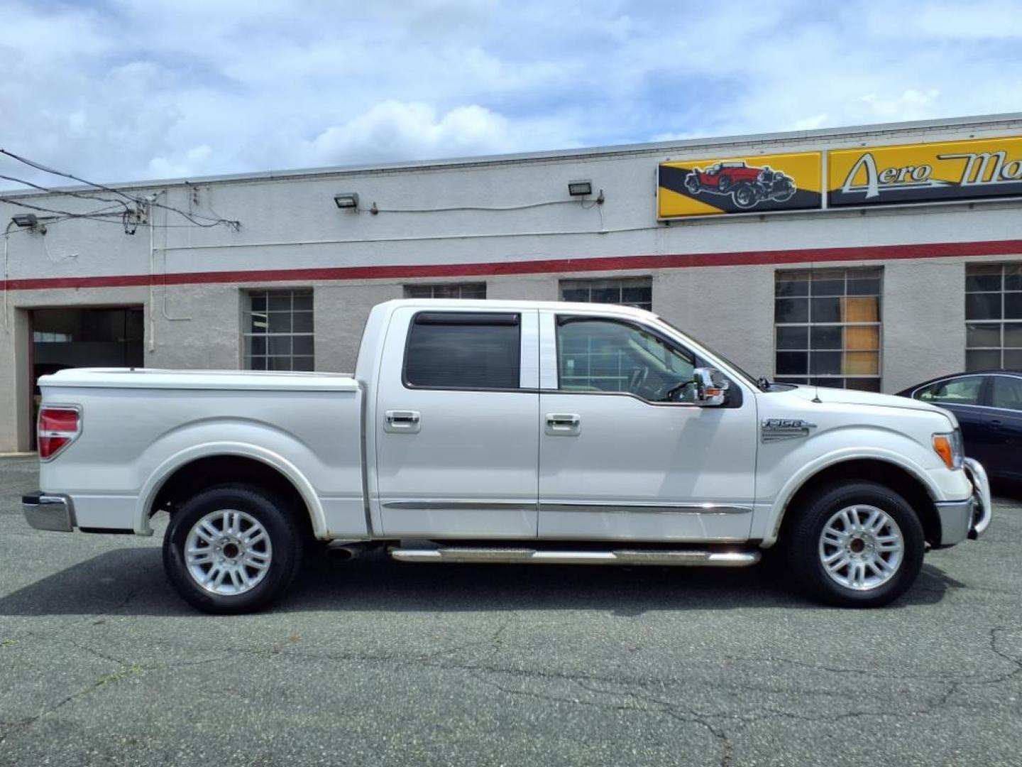 2010 Oxford White Ford F-150 Lariat (1FTFW1CV8AF) with an 5.4L Triton 5.4L Flex Fuel V8 320hp 390ft. lbs. Sequential-Port F.I. engine, 6-Speed Automatic transmission, located at 50 Eastern Blvd., Essex, MD, 21221, (410) 686-3444, 39.304367, -76.484947 - Photo#5