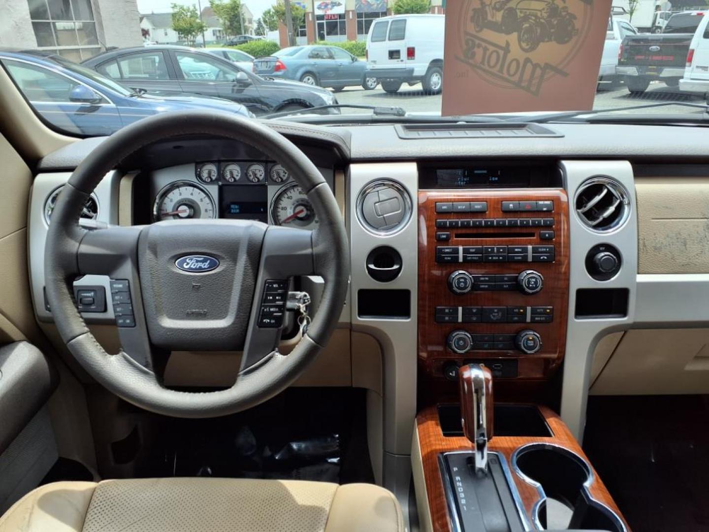 2010 Oxford White Ford F-150 Lariat (1FTFW1CV8AF) with an 5.4L Triton 5.4L Flex Fuel V8 320hp 390ft. lbs. Sequential-Port F.I. engine, 6-Speed Automatic transmission, located at 50 Eastern Blvd., Essex, MD, 21221, (410) 686-3444, 39.304367, -76.484947 - Photo#12