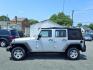 2011 Silver Jeep Wrangler Unlimited (1J4BA3H17BL) with an 3.8L 6 Cylinder Sequential-Port F.I. engine, V6 transmission, located at 50 Eastern Blvd., Essex, MD, 21221, (410) 686-3444, 39.304367, -76.484947 - Photo#1