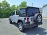 2011 Silver Jeep Wrangler Unlimited (1J4BA3H17BL) with an 3.8L 6 Cylinder Sequential-Port F.I. engine, V6 transmission, located at 50 Eastern Blvd., Essex, MD, 21221, (410) 686-3444, 39.304367, -76.484947 - Photo#2