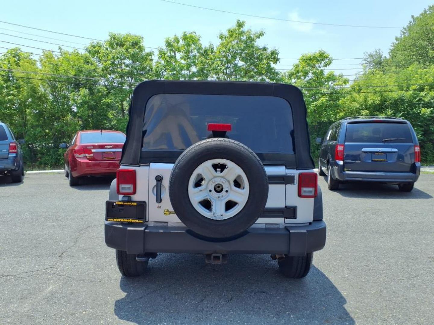 2011 Silver Jeep Wrangler Unlimited (1J4BA3H17BL) with an 3.8L 6 Cylinder Sequential-Port F.I. engine, V6 transmission, located at 50 Eastern Blvd., Essex, MD, 21221, (410) 686-3444, 39.304367, -76.484947 - Photo#3