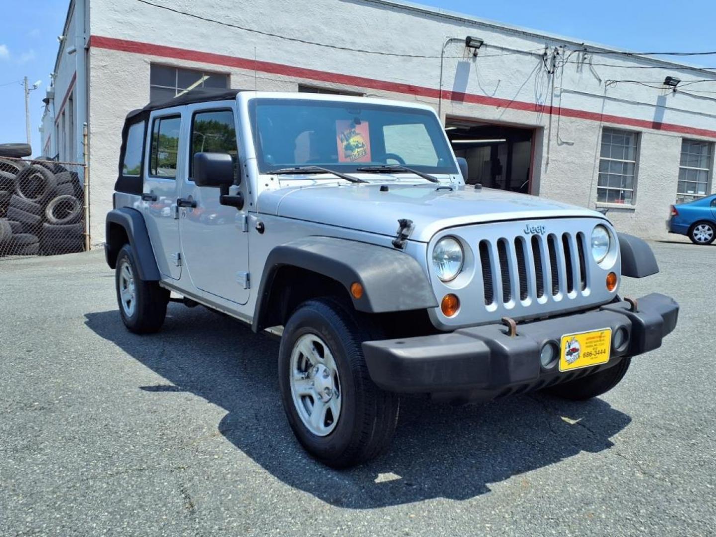 2011 Silver Jeep Wrangler Unlimited (1J4BA3H17BL) with an 3.8L 6 Cylinder Sequential-Port F.I. engine, V6 transmission, located at 50 Eastern Blvd., Essex, MD, 21221, (410) 686-3444, 39.304367, -76.484947 - Photo#7