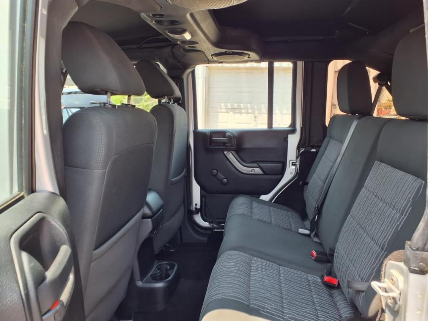 2011 Silver Jeep Wrangler Unlimited (1J4BA3H17BL) with an 3.8L 6 Cylinder Sequential-Port F.I. engine, V6 transmission, located at 50 Eastern Blvd., Essex, MD, 21221, (410) 686-3444, 39.304367, -76.484947 - Photo#12