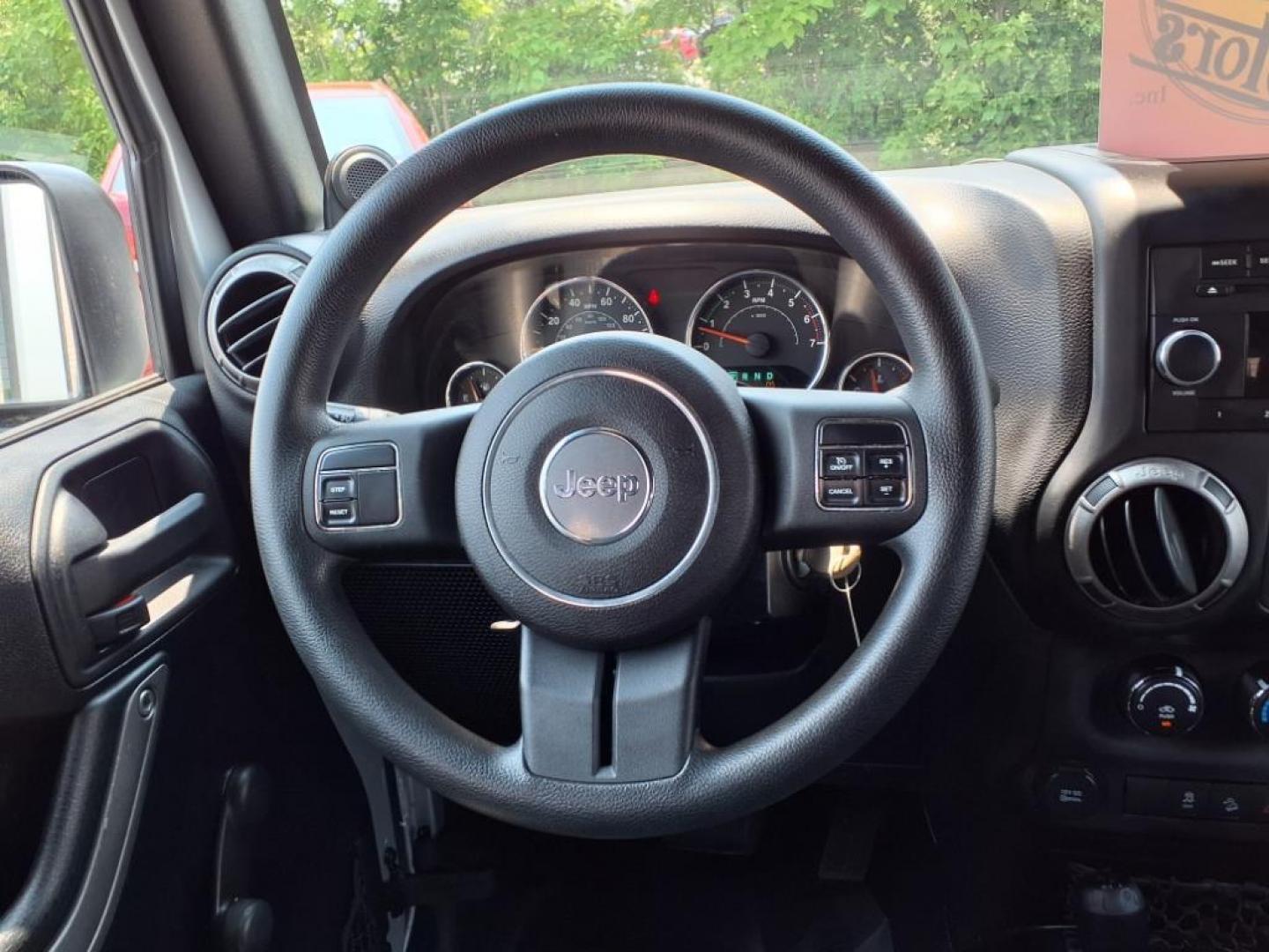 2011 Silver Jeep Wrangler Unlimited (1J4BA3H17BL) with an 3.8L 6 Cylinder Sequential-Port F.I. engine, V6 transmission, located at 50 Eastern Blvd., Essex, MD, 21221, (410) 686-3444, 39.304367, -76.484947 - Photo#13