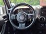 2011 Silver Jeep Wrangler Unlimited (1J4BA3H17BL) with an 3.8L 6 Cylinder Sequential-Port F.I. engine, V6 transmission, located at 50 Eastern Blvd., Essex, MD, 21221, (410) 686-3444, 39.304367, -76.484947 - Photo#13