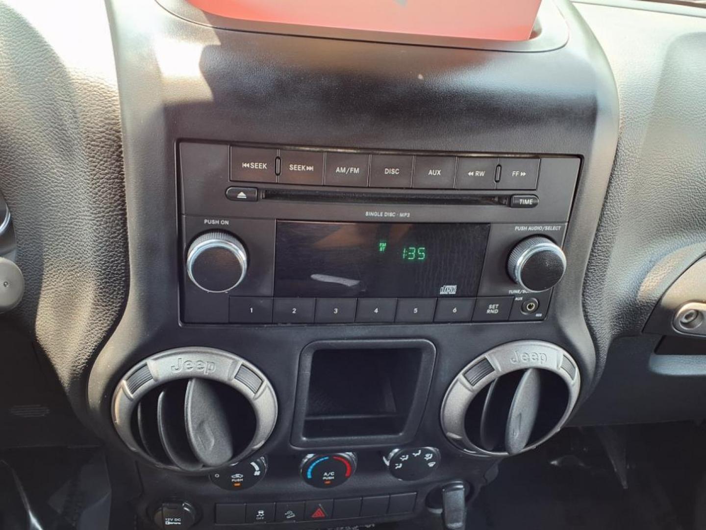2011 Silver Jeep Wrangler Unlimited (1J4BA3H17BL) with an 3.8L 6 Cylinder Sequential-Port F.I. engine, V6 transmission, located at 50 Eastern Blvd., Essex, MD, 21221, (410) 686-3444, 39.304367, -76.484947 - Photo#18