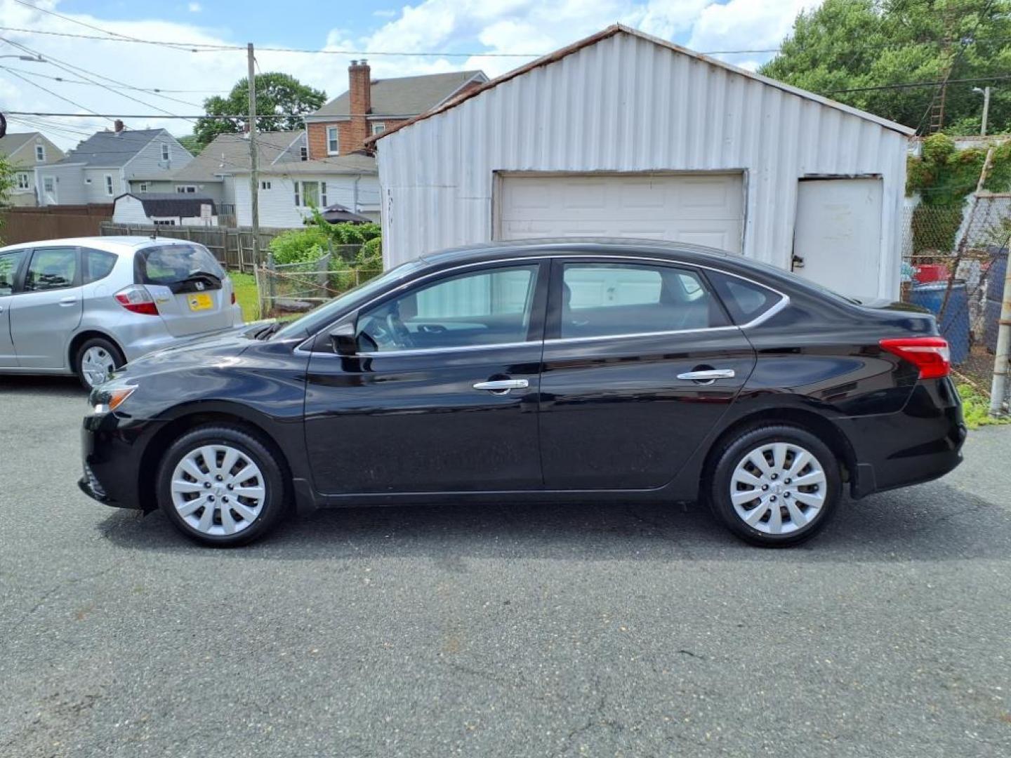 2016 Super Black Nissan Sentra S (3N1AB7AP1GY) with an 1.8L 1.8L I4 130hp 128ft. lbs. Sequential-Port F.I. engine, CVT transmission, located at 50 Eastern Blvd., Essex, MD, 21221, (410) 686-3444, 39.304367, -76.484947 - Photo#1