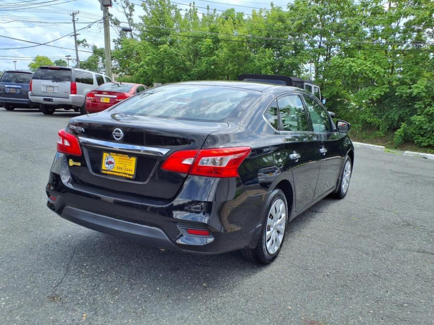 2016 Super Black Nissan Sentra S (3N1AB7AP1GY) with an 1.8L 1.8L I4 130hp 128ft. lbs. Sequential-Port F.I. engine, CVT transmission, located at 50 Eastern Blvd., Essex, MD, 21221, (410) 686-3444, 39.304367, -76.484947 - Photo#4
