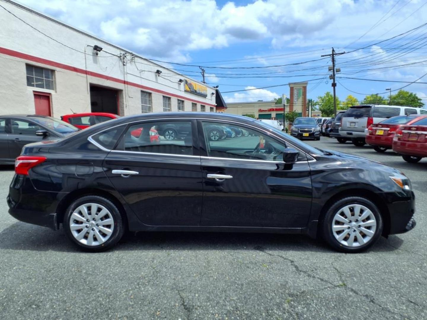 2016 Super Black Nissan Sentra S (3N1AB7AP1GY) with an 1.8L 1.8L I4 130hp 128ft. lbs. Sequential-Port F.I. engine, CVT transmission, located at 50 Eastern Blvd., Essex, MD, 21221, (410) 686-3444, 39.304367, -76.484947 - Photo#5