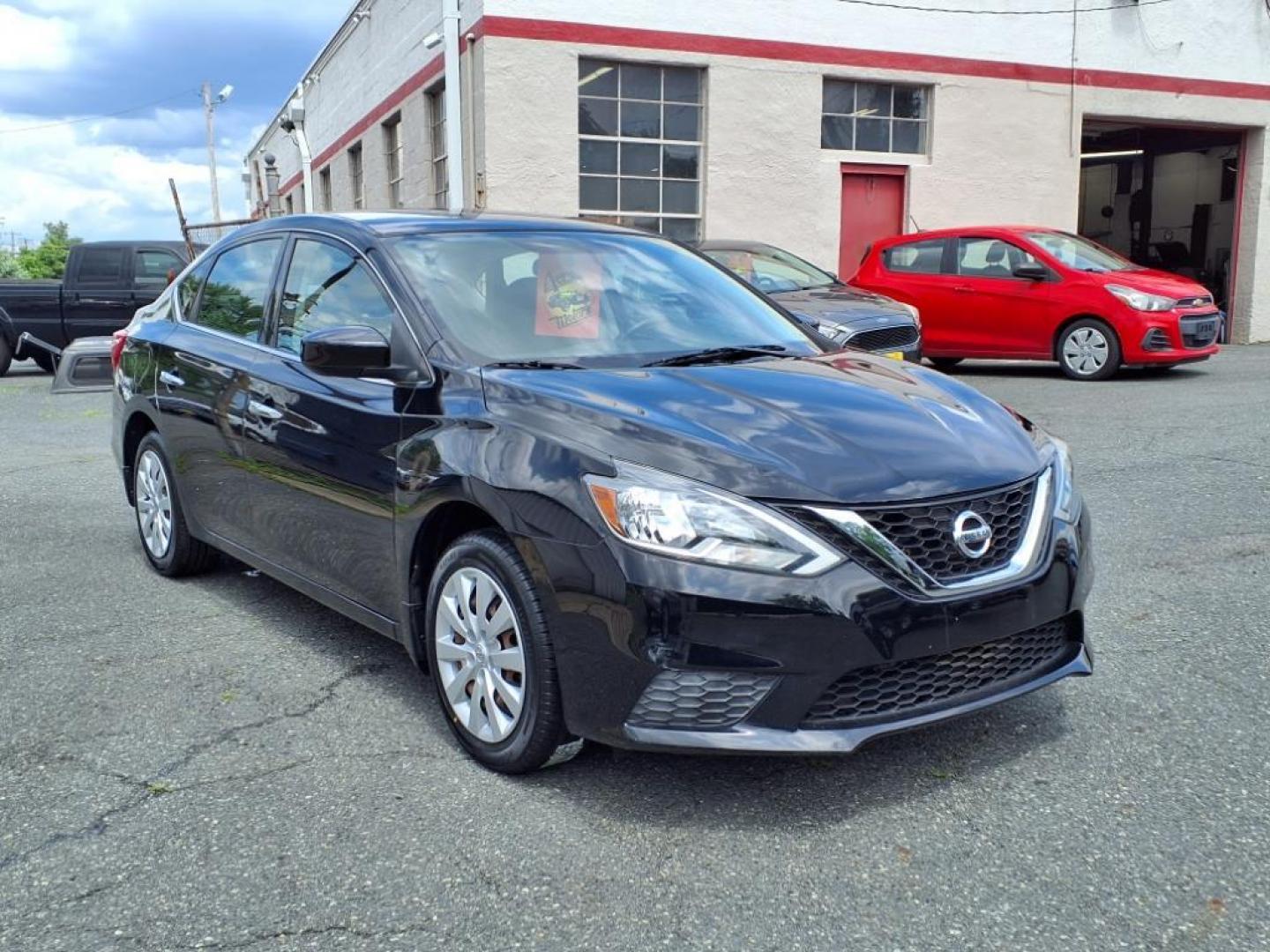 2016 Super Black Nissan Sentra S (3N1AB7AP1GY) with an 1.8L 1.8L I4 130hp 128ft. lbs. Sequential-Port F.I. engine, CVT transmission, located at 50 Eastern Blvd., Essex, MD, 21221, (410) 686-3444, 39.304367, -76.484947 - Photo#6