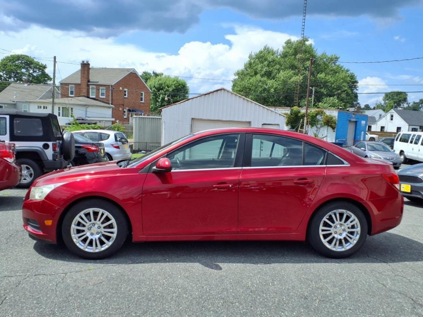 2011 Crystal Red Metallic Tintcoat Chevrolet Cruze ECO (1G1PJ5S97B7) with an 1.4L Ecotec 1.4L Turbo I4 138hp 148ft. lbs. Sequential-Port F.I. engine, 6-Speed Shiftable Automatic transmission, located at 50 Eastern Blvd., Essex, MD, 21221, (410) 686-3444, 39.304367, -76.484947 - Photo#1