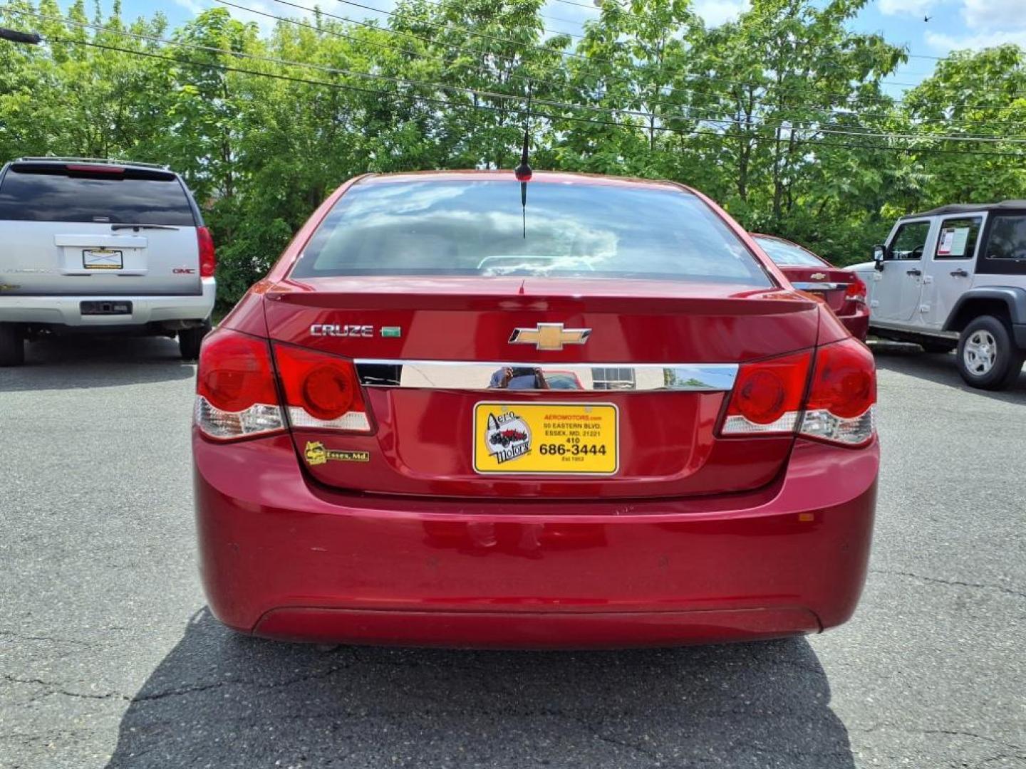 2011 Crystal Red Metallic Tintcoat Chevrolet Cruze ECO (1G1PJ5S97B7) with an 1.4L Ecotec 1.4L Turbo I4 138hp 148ft. lbs. Sequential-Port F.I. engine, 6-Speed Shiftable Automatic transmission, located at 50 Eastern Blvd., Essex, MD, 21221, (410) 686-3444, 39.304367, -76.484947 - Photo#3